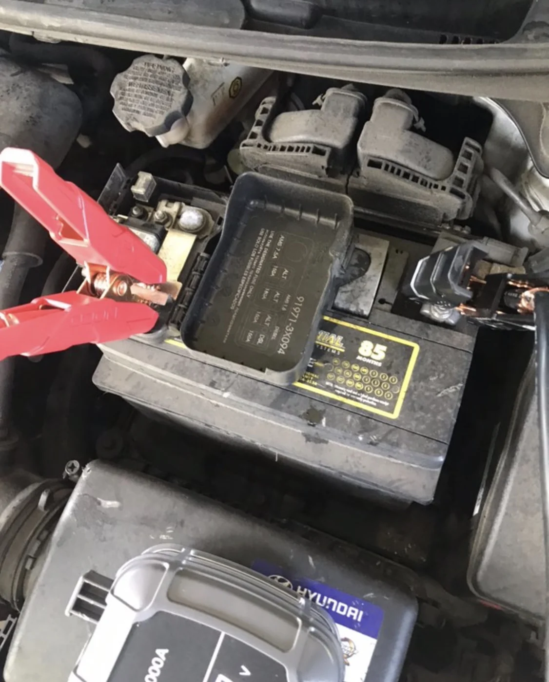 Testing equipment connected to an automotive battery